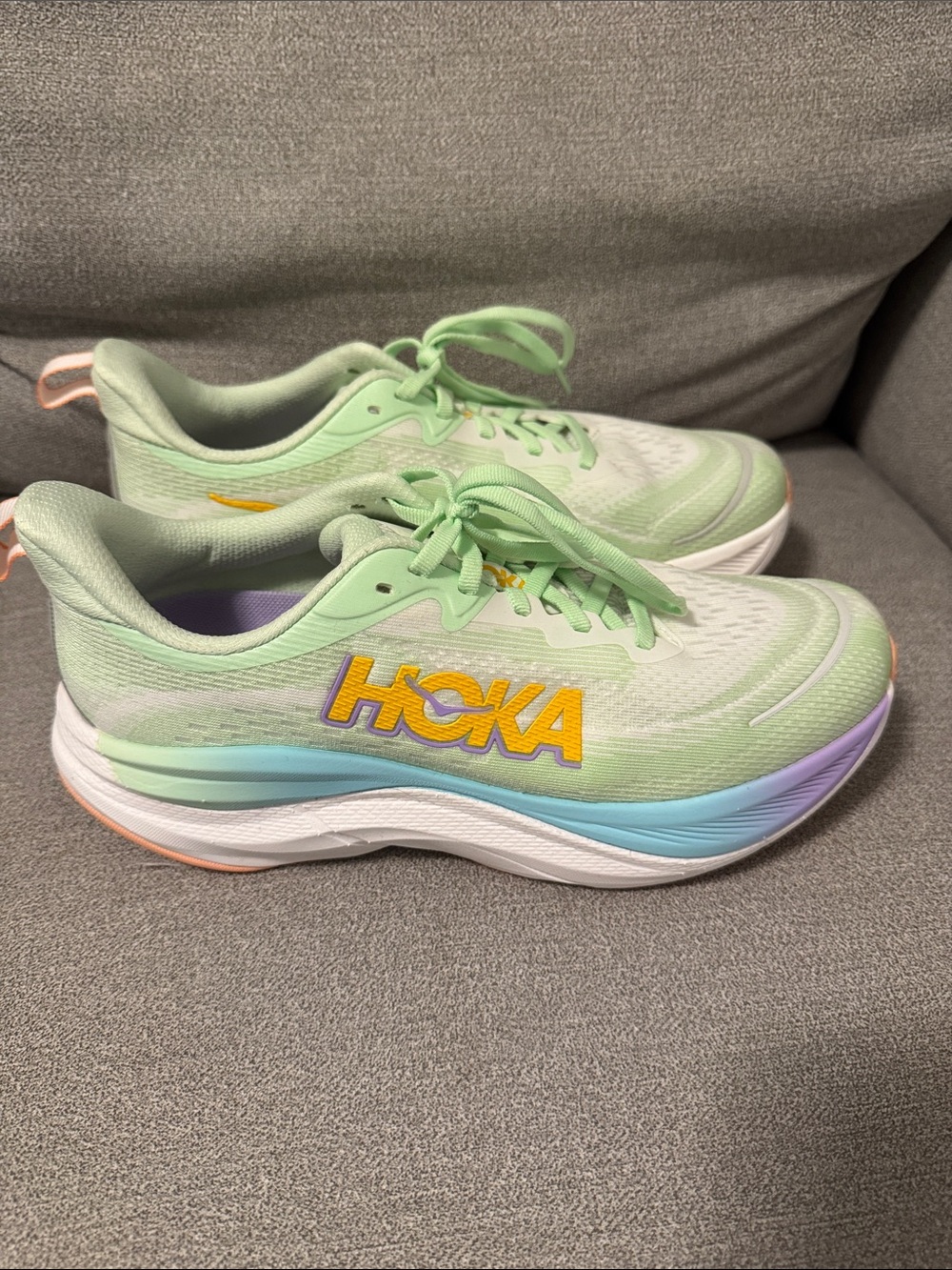 Hoka women’s Light Mint Running Sneakers with Pastel Gradient Accents